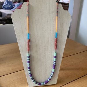 Handmade African vinyl beaded necklace.